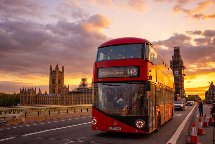 Bus crosses bridge in Westminster, London